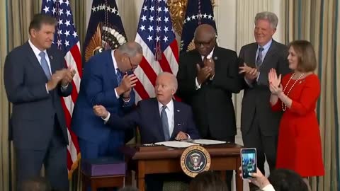 Democrats cheer as Joe Biden signs new bill hiring 87,000 IRS agents to target the middle class