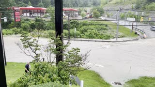 Road Turns Into Fast Flowing River During Flood