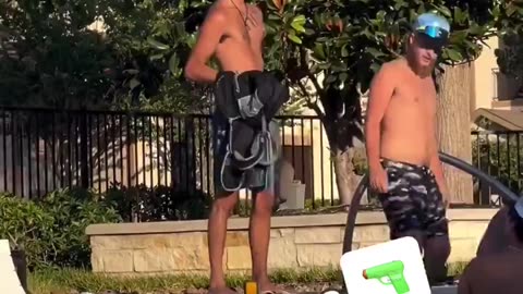 Pulling Gun At The Pool