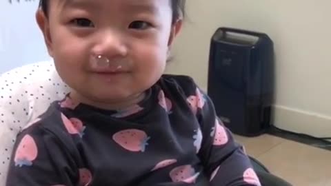 A baby's runny nose balloon