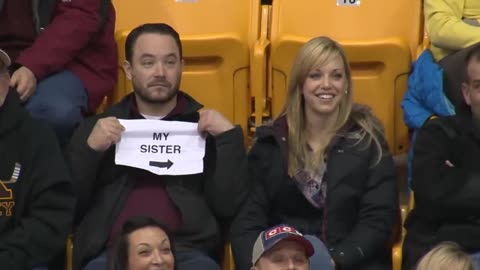 Guy Pulls Out Sign on Gophers Kiss Cam