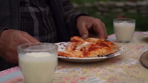 A perfect day making cheese with your hands in the mountains