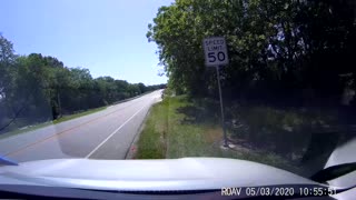 Unaware Cyclist Turns Into Passing Car