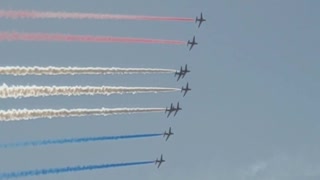 American flag fly over!