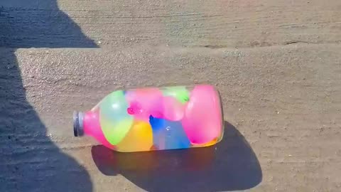 Balloons glass bottle crushing #short#experment