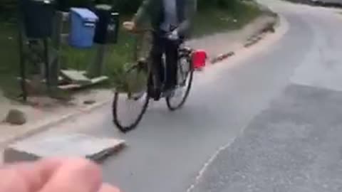 Guy leaves on head small bike ramp jump