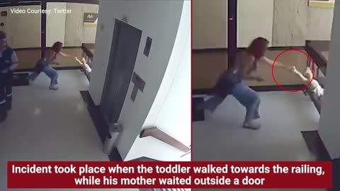 On cam_ Mom saves toddler from falling off building stairwell.mp4