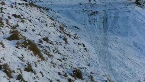 Cyclist in the Snow Overshoots Landing