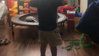 My nephew putting on beads