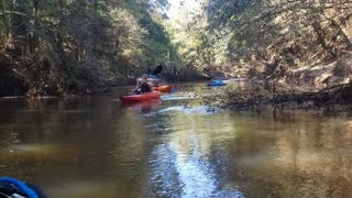 Kayaking on double bridges creek in an old town kayak