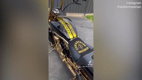 Bikie Allan Meehan shows off his custom painted Comanchero bike