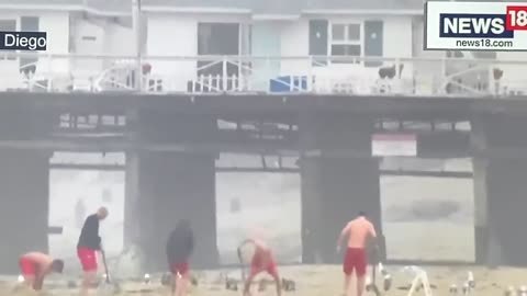 Updates: Life guards at crystal pier digging holes for the expected bodies washing ashore