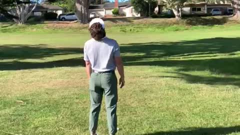 Dude Loses His Club during Attempt to Get His Golf Ball Out of a Tree