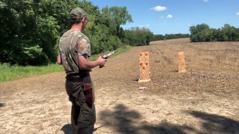 Shooting revolvers like in the old westerns