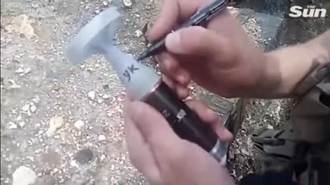 Ukrainian soldier writes 'For Ukraine' on bomb before dropping it on Russian targets-1