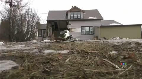 Driver dead after semi-truck crashes into Edmonton home