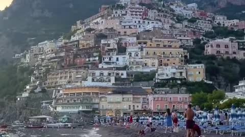 POV: It's summer in Italy.you re swimming in this amazing beach and this is your view