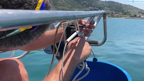 Doing minor repairs on a sailing yacht