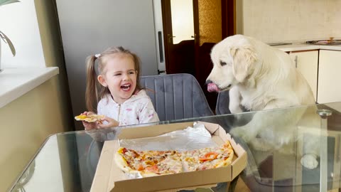 What Does Golden Retriever Puppy Do When Little Girl Eats Pizza [Try not to Laugh]