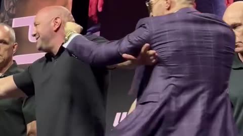 Conor McGregor and Dustin Poirier face off at the UFC 264 Press Conference.