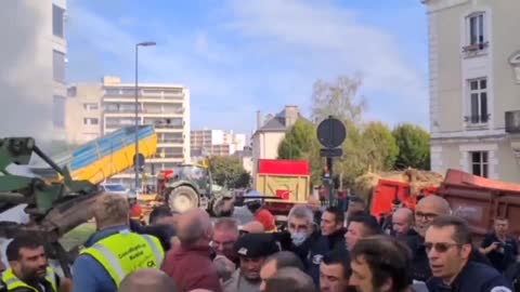 In Limoges, France, protesting farmers and the police dispersing them