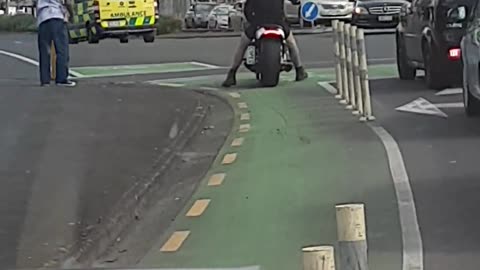 Biker Gets His Helmet Cleaned