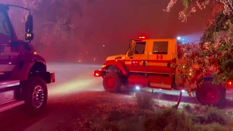 Firefighters battle the 674-acre Gold Ranch Fire in Nevada