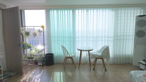 Modern Korean Apartment Interior with a Gentle Glide Toward the Window