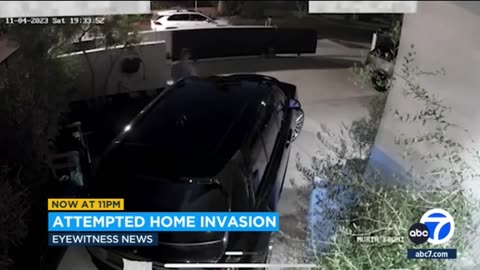 2 armed thugs snuck up behind a man as he entered his home on Saturday night in LA.