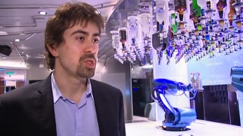 Robot bartender creates a stir aboard world's first 'smart ship'