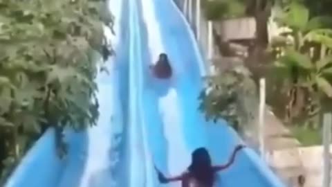 Funny girl fails when sliding in water slide🏄‍♂️