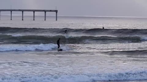 CATCHING A RIDE Ocean Beach San Diego