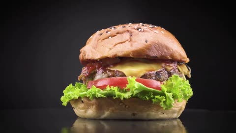 Spinning burger with ketchup