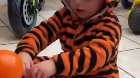 Funny baby wear a tiger suit