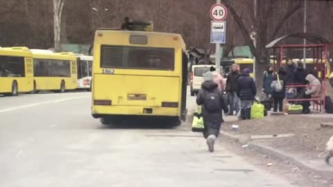 Ukrainian citizens crossing the checkpoint as they escaping from the Russian shelled west Kyiv