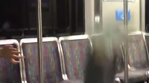 Guy falls on subway pole