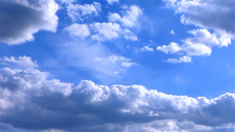 Clouds float across the sky