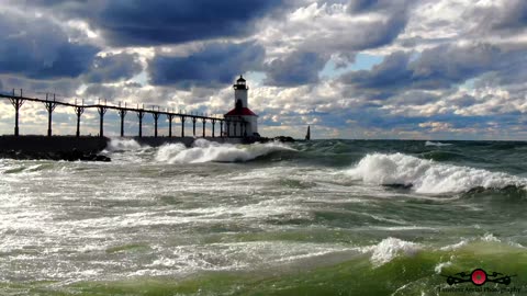 Stunning Waves Washing Over The Lighthouse Pier 4K Drone Footage