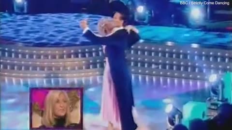 2005: Brendan Cole slaps Fiona Philips' bottom at Strictly rehearsal