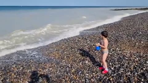 Kids Playing on the Sea Beach