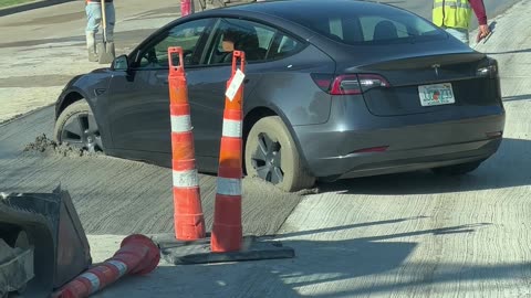 Car Stuck In Wet Concrete