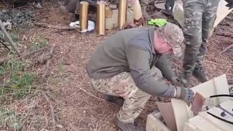 Ukrainian Artillery Crew Prepares Today's Shells