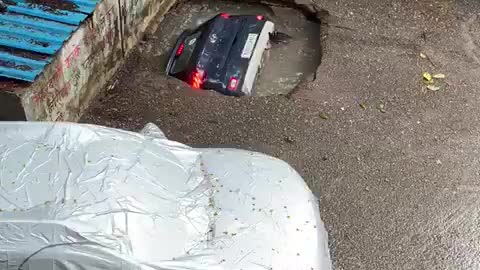 Car rams into the ground due to rain in Mumbai