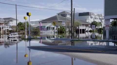 North Carolina beach town cleans up after 'once-in-a-century' storm