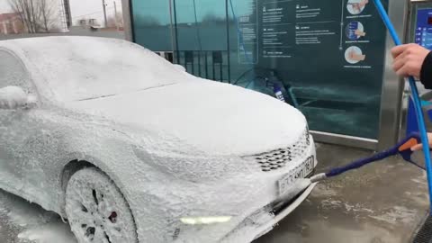 Washing a dirty Kia Optima GT car - foam, wax, osmosis.