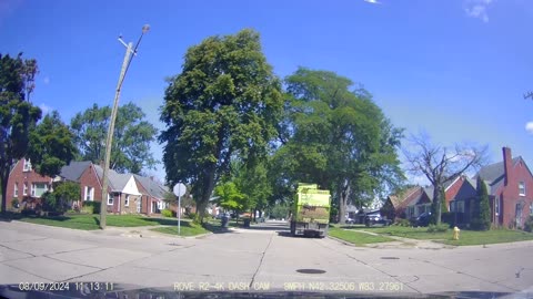 Footage Of A Garbage Truck On Kingsbury Avenue, Dearborn, Michigan, August 9, 2024