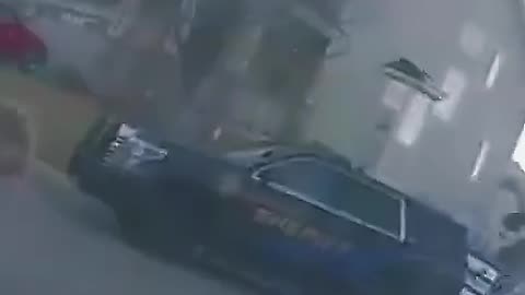 Officer Saves A Dog From Burning Car