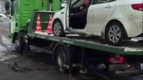 Russian refuses to be towed away