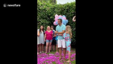 Father-to-be FAILS at firing gender reveal cannon so wife takes over