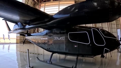 Embraer's Eve rolls out flying taxi prototype